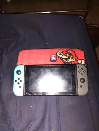 Nintendo Switch V1 + Custodia SuperMario + Just Dance