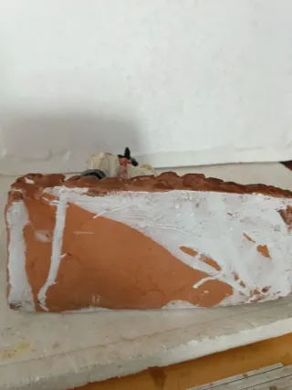 Statuina Pulcinella in terracotta