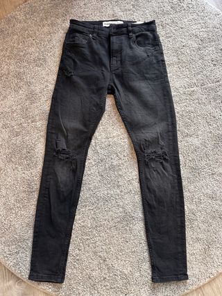 Pantalón vaquero negro desgastado talla 36