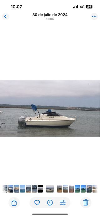 Barca semigabinada de fibra 5,8m