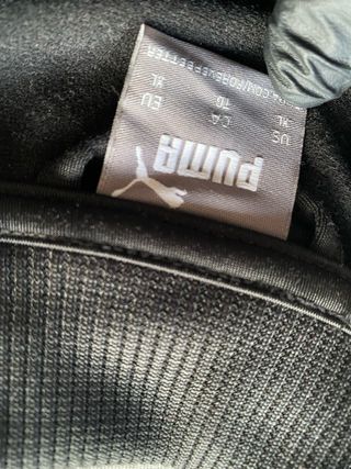 Giacca sportiva Puma nera con strisce bianche