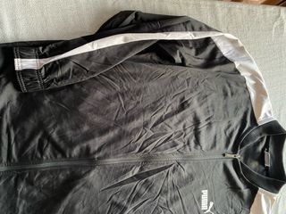 Giacca sportiva Puma nera con strisce bianche