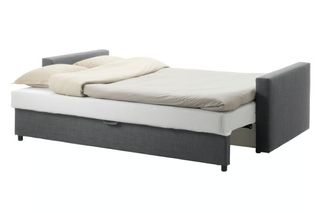 Sofá cama gris de tela