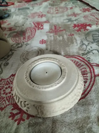 faro in ceramica con candela all'interno