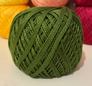 Ovillos de perle Rubi Oro grosor 5, precio unidad