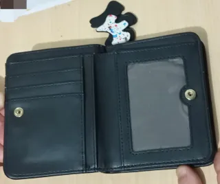 Monedero negro con adorno de perro