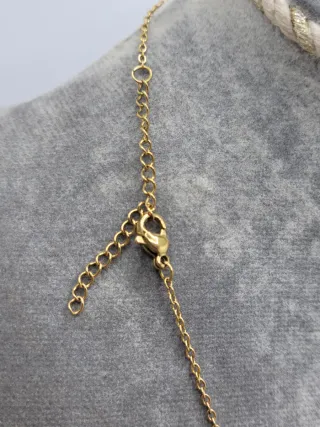 Colgante ovalado acero dorado Virgen