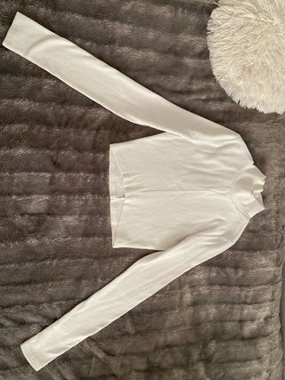 Jersey blanco de punto cuello alto