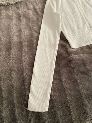 Jersey blanco de punto cuello alto