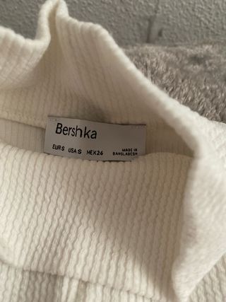 Jersey blanco de punto cuello alto