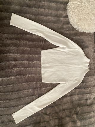 Jersey blanco de punto cuello alto