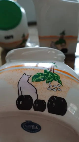 Juego vintage de tarros de cocina de porcelana.