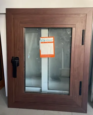 Ventana nogal con solape