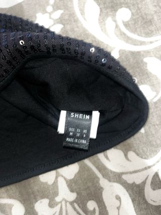 Top bandeau lentejuelas negro