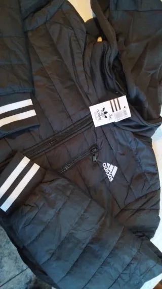 Bolsos Guess y Tous Negro