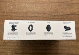 Secador de pelo rosa y plateado