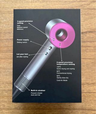 Secador de pelo rosa y plateado