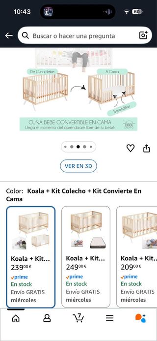 Cuna de bebé blanca con patas de madera