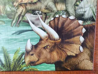 Cuadro Puzzle Dinosaurios con marco marrón