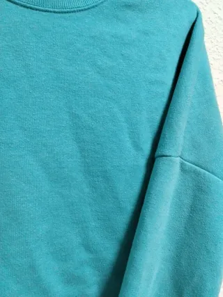 Sudadera azul turquesa