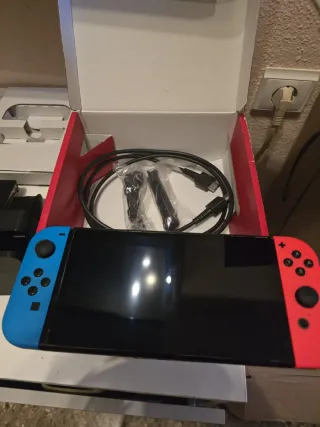 Nintendo Switch OLED Blu e Rosso