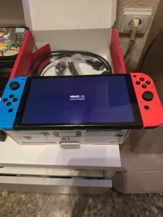 Nintendo Switch OLED Blu e Rosso