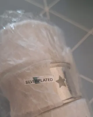 Servilleteros de metal plateado