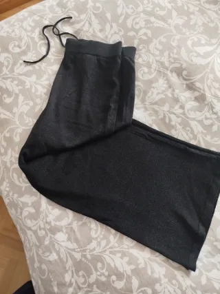 Pantalón tela brillante elástico