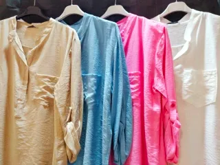 Blusa beige con bolsillo