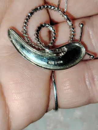 Collana scintillante con ciondolo a lumaca