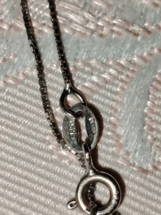 Collana scintillante con ciondolo a lumaca