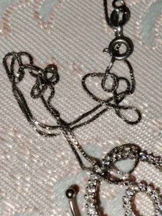 Collana scintillante con ciondolo a lumaca