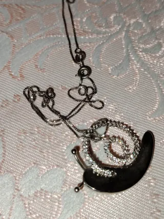 Collana scintillante con ciondolo a lumaca