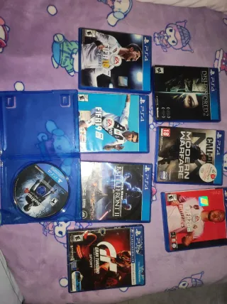 PS4 (PlayStation 4) con 3 mandos y 8 juegos