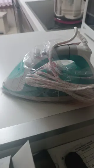 Plancha de ropa a estrenar