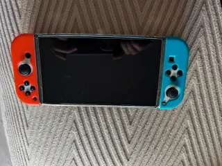 Nintendo Switch OLED + Accessori