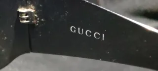 Gafas de sol Gucci negras y plateadas