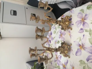 Portavelas de bronce dorado