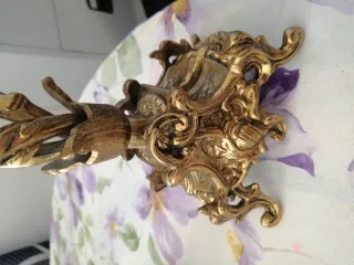 Portavelas de bronce dorado