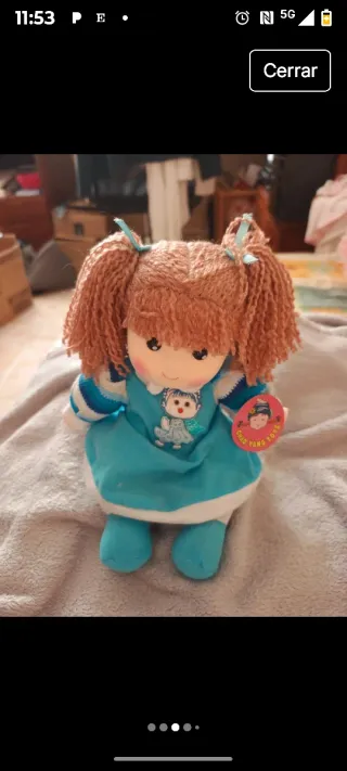 Muñeca de trapo musical con movimiento de cabeza