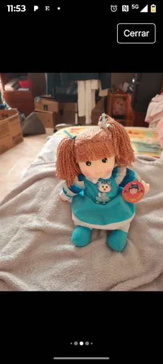 Muñeca de trapo musical con movimiento de cabeza