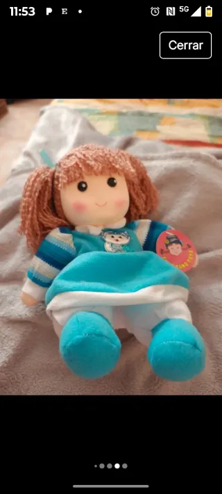 Muñeca de trapo musical con movimiento de cabeza