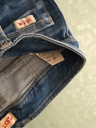 Jeans donna blu strappati