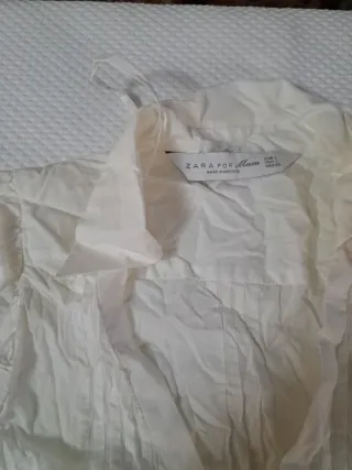 Camisa premamá blanca sin mangas