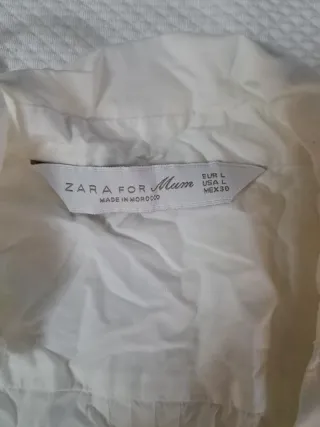 Camisa premamá blanca sin mangas