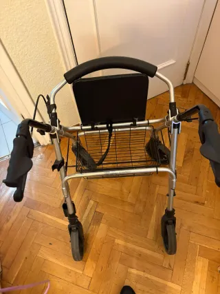 Andador 4 ruedas con freno, cesta y asiento