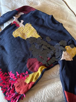 Jersey con lentejuelas y apliques