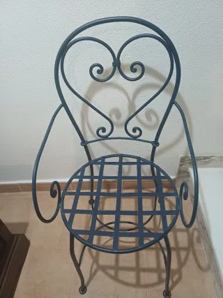 Silla de forja decorativa