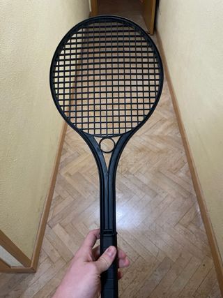 Raqueta de tenis de juguete negra