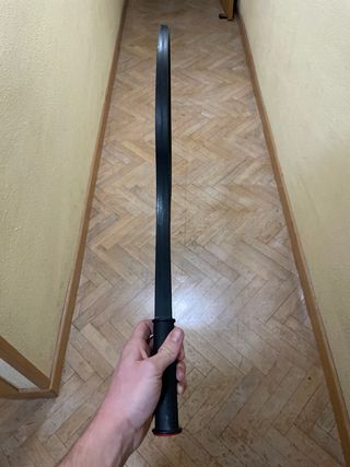 Raqueta de tenis de juguete negra